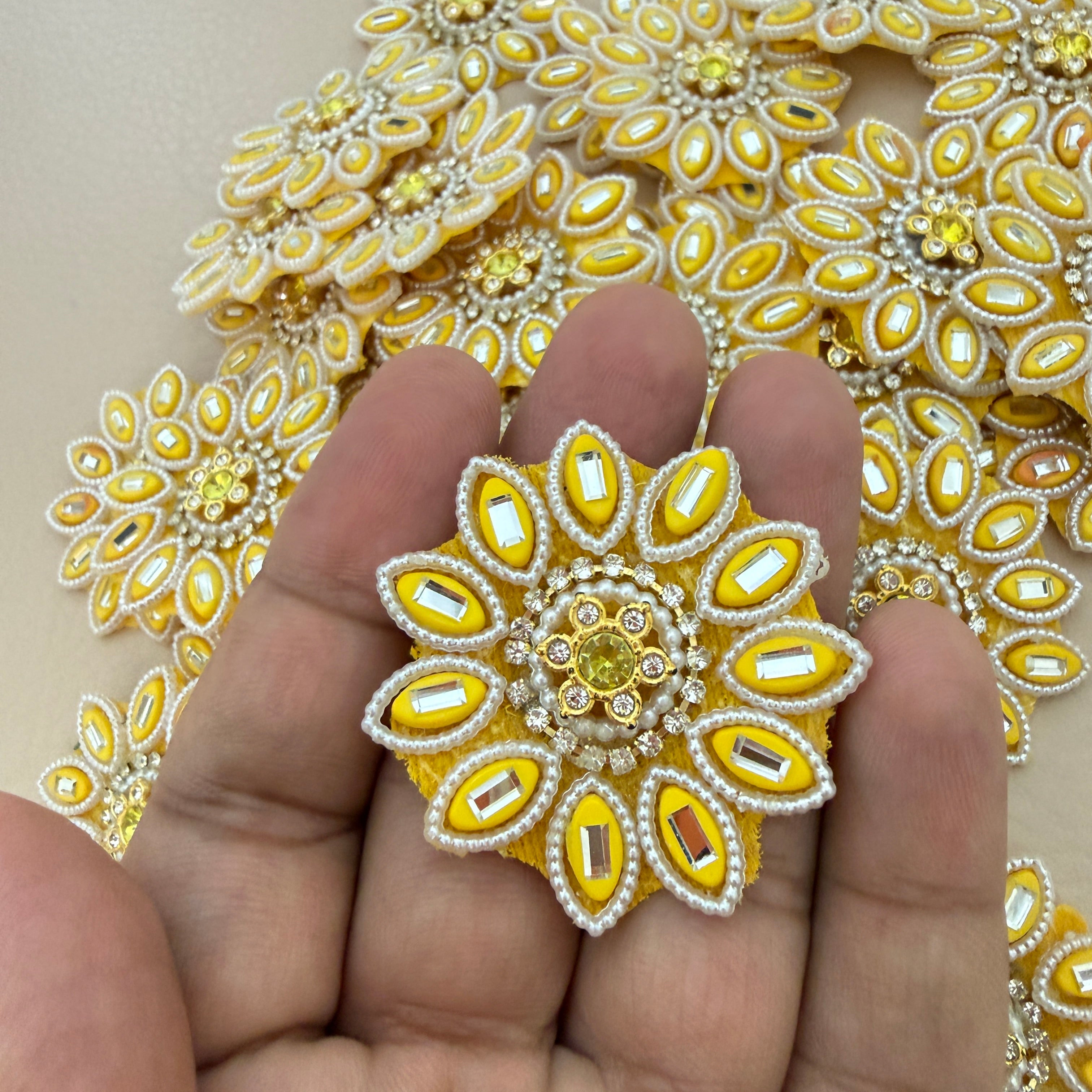 10 yellow floral patches arranged in a circle