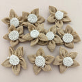 Single handmade jute burlap flower patch with ruler showing 7cm size