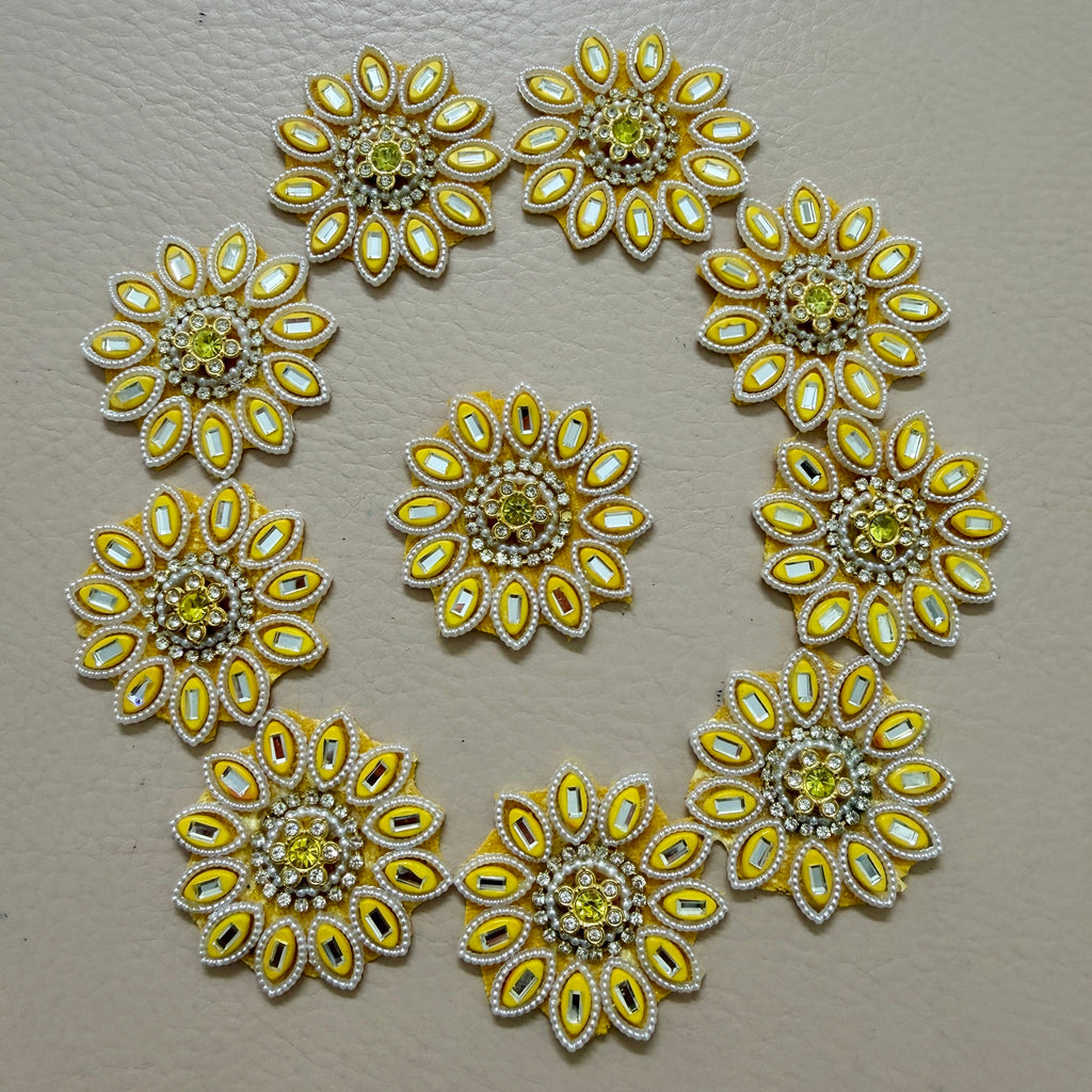 Yellow floral rhinestone patch with ruler showing 2 inch size